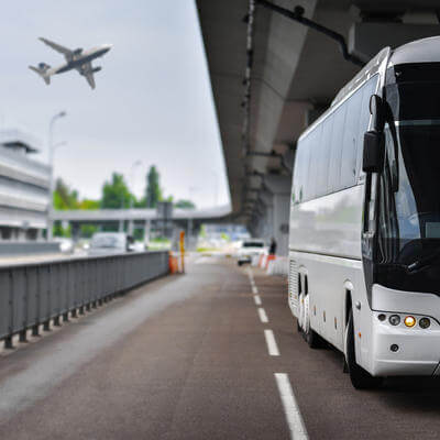 Shuttle bus brought people to the airport for the flight