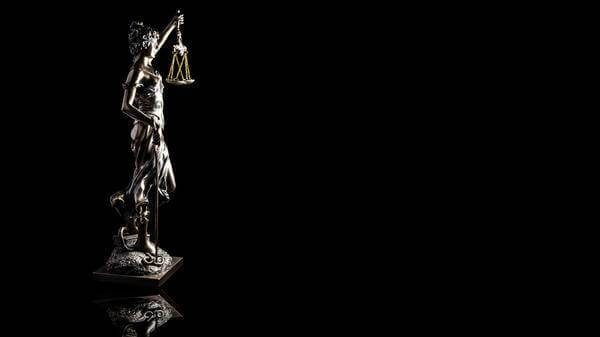 lady justice dark background
