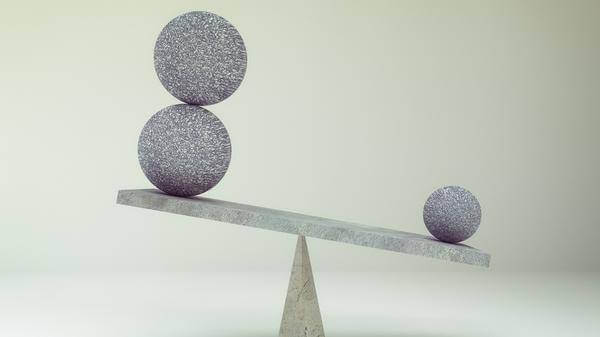 Balancing rocks on a scale
