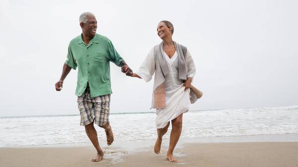 senior couple on beach