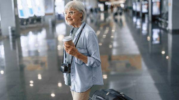 Senior woman at airport