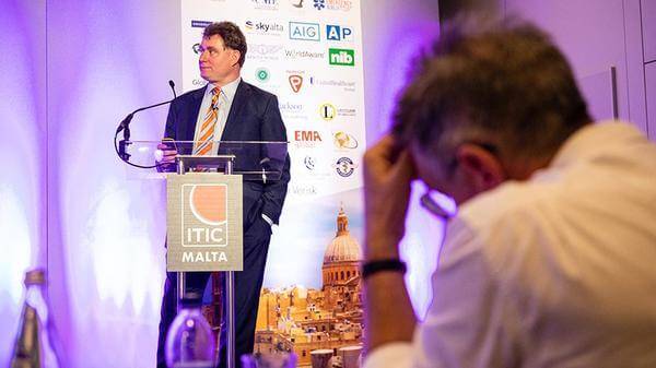 John Armstrong speaking at the insurance premiums pricing session