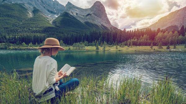 Female traveller reading a book