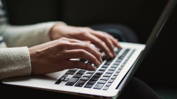 Typing into Laptop