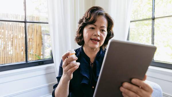 Woman using telemedicine