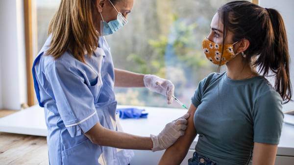 Expat having a Covid-19 vaccine