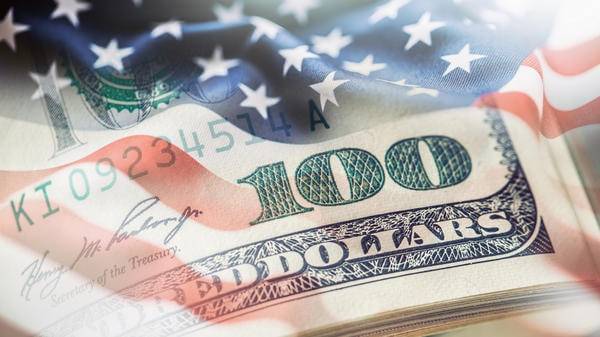 American US flag with 100 dollar bill superimposed