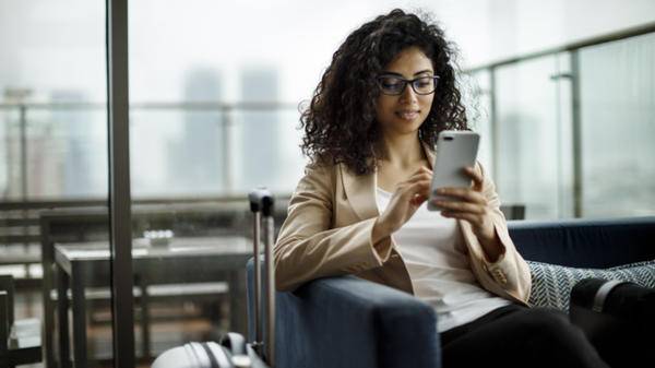 Woman on phone at airport