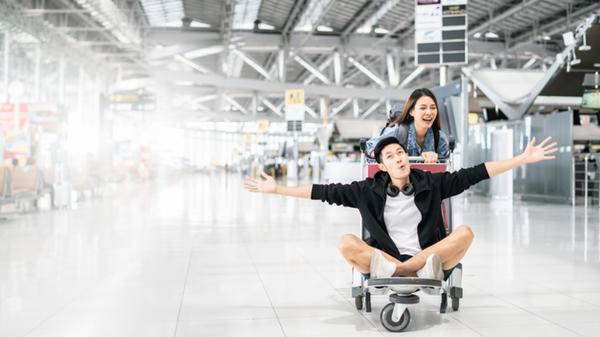 happy couple airport