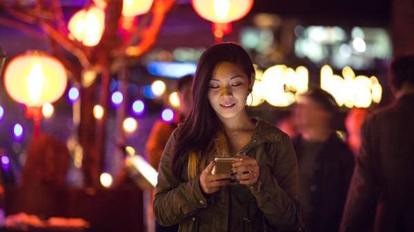 lady uses phone in taiwan