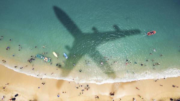 airplane beach GettyImages-621821582