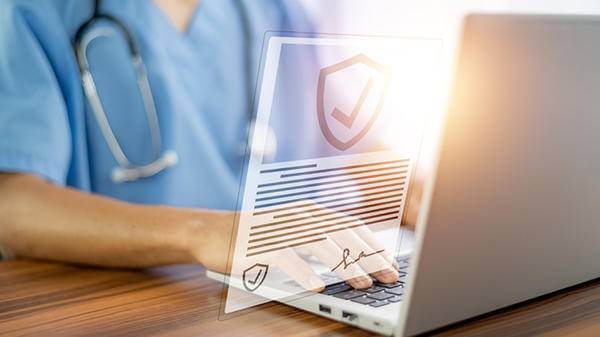 Doctor using computer