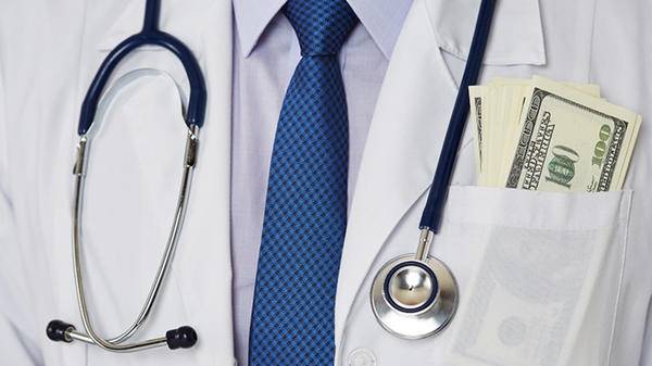 Money in doctors jacket pocket