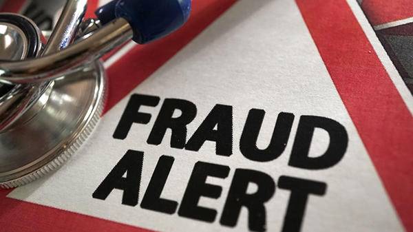 Fraud alert and stethoscope