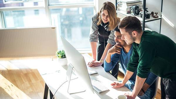 People looking at computer screen