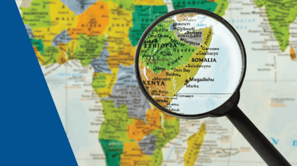 magnifying glass over Africa on map
