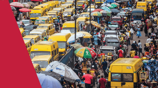 busy street full of cars and people