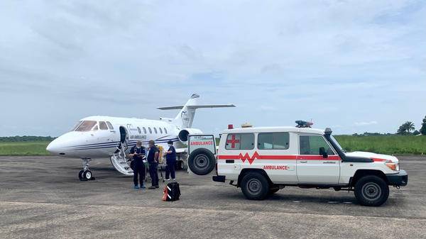 air ambulance plane and truck at airport