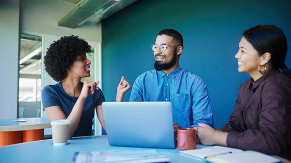 Co-workers talking in the office