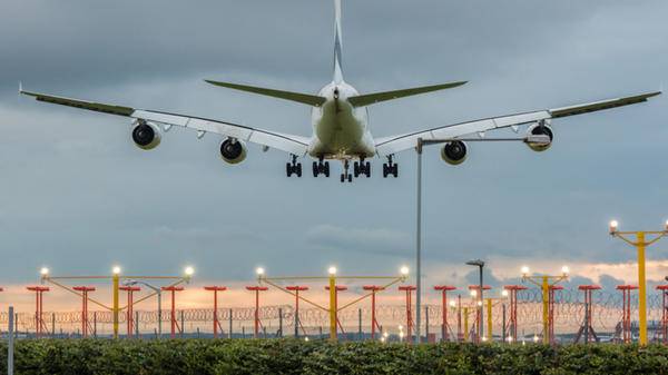 Image of plane leaving airport