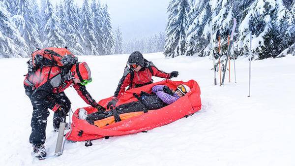 Emergency help ski accident 