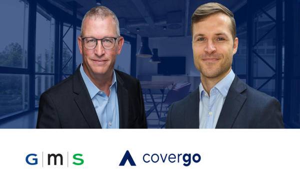 GMS and CoverGo employees celebrating partnership