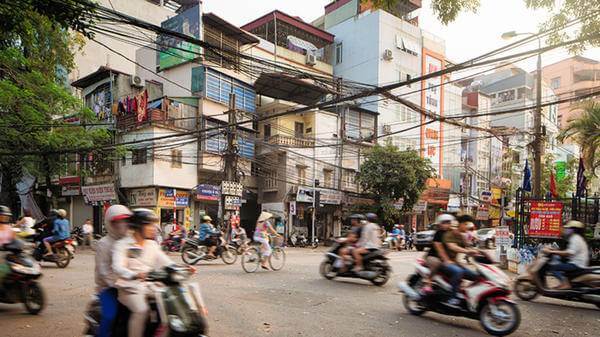 People using motorbikes in Asia