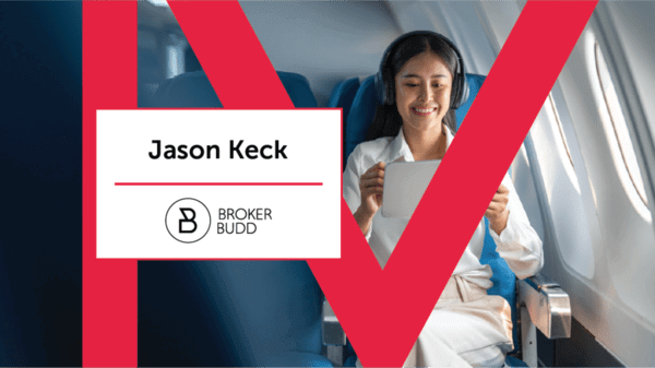 Person using iPad on a airplane 