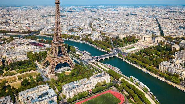Aerial view of Paris with Eiffel Tower in foreground