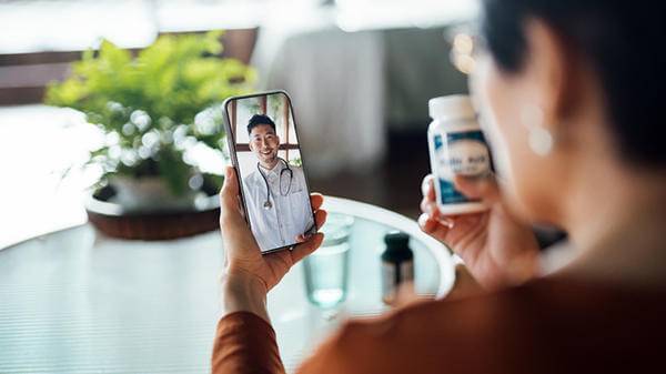 Person talking to doctor on the phone 