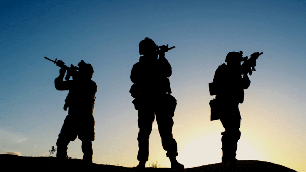 silhouette of soldiers 