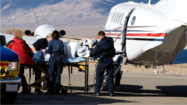 transfering patient into air ambulance