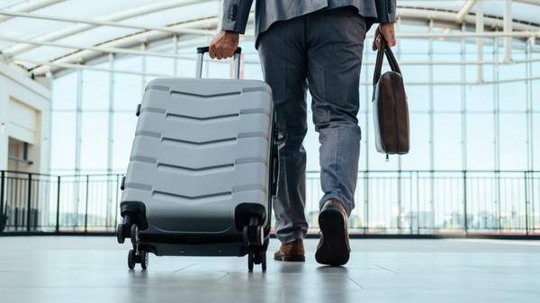 Image of workers embarking on business trip