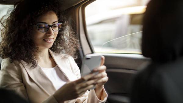 Woman checking app on her phone