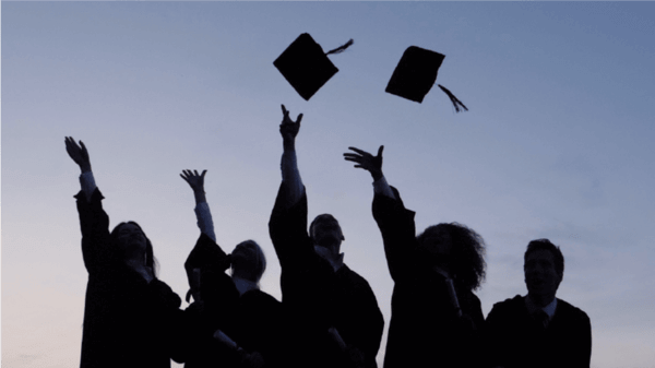 Students celebrating graduation