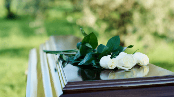 Roses on top of a coffin