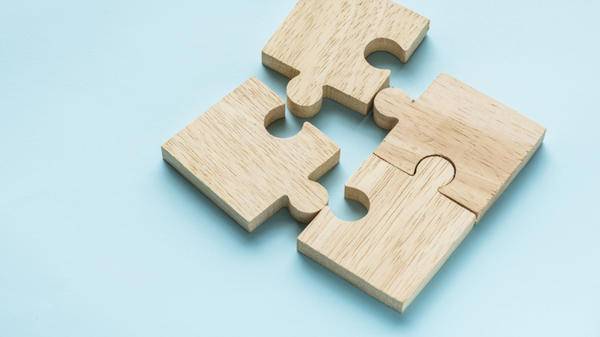 Jigsaw teamwork concept macro shot