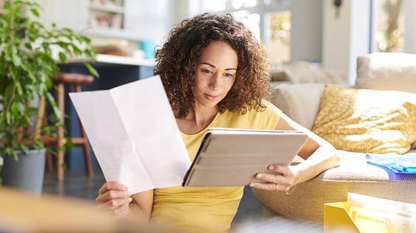 Person looking at documents at home