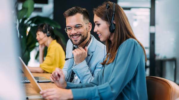People in office talking with headset
