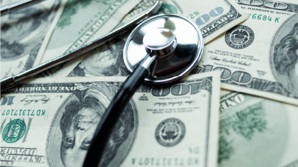 Money and a stethoscope
