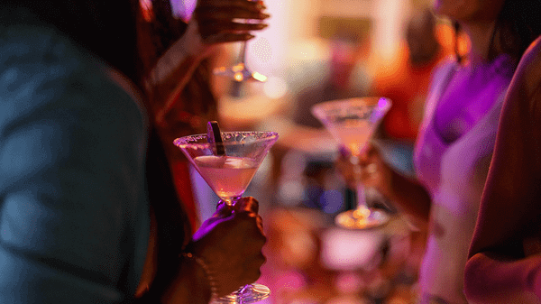 Picture of people drinking cocktails in a bar