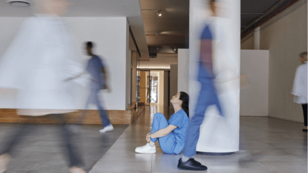 A busy hospital with a stressed nurse