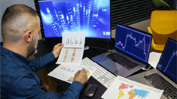 Man searching through lots of documents