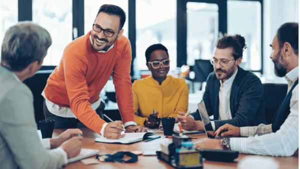 5 people in a business meeting