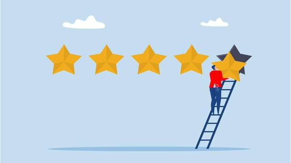 Businessman holding 5th star climb up ladder to put on best rating