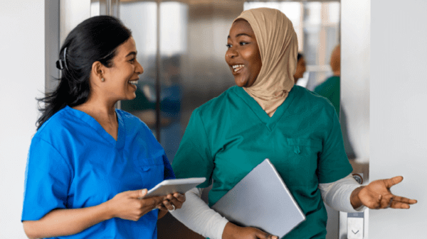 Two nurses talking to each other