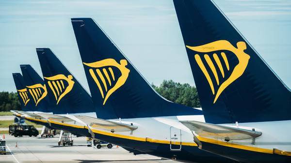 A row of Airplanes belonging to Ryanair Parked at the tarmac