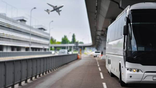 Shuttle bus brought people to the airport for the flight
