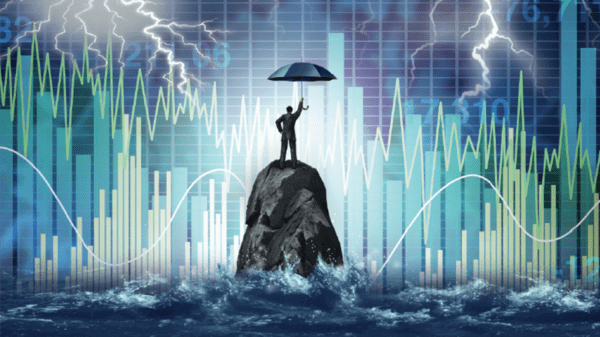 Man standing in front of graphs 