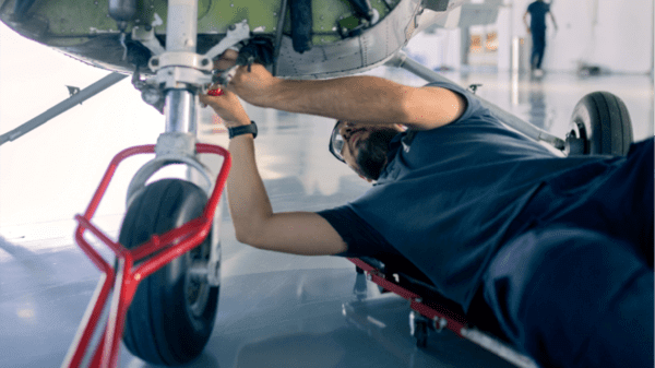 Man fixing an aircraft
